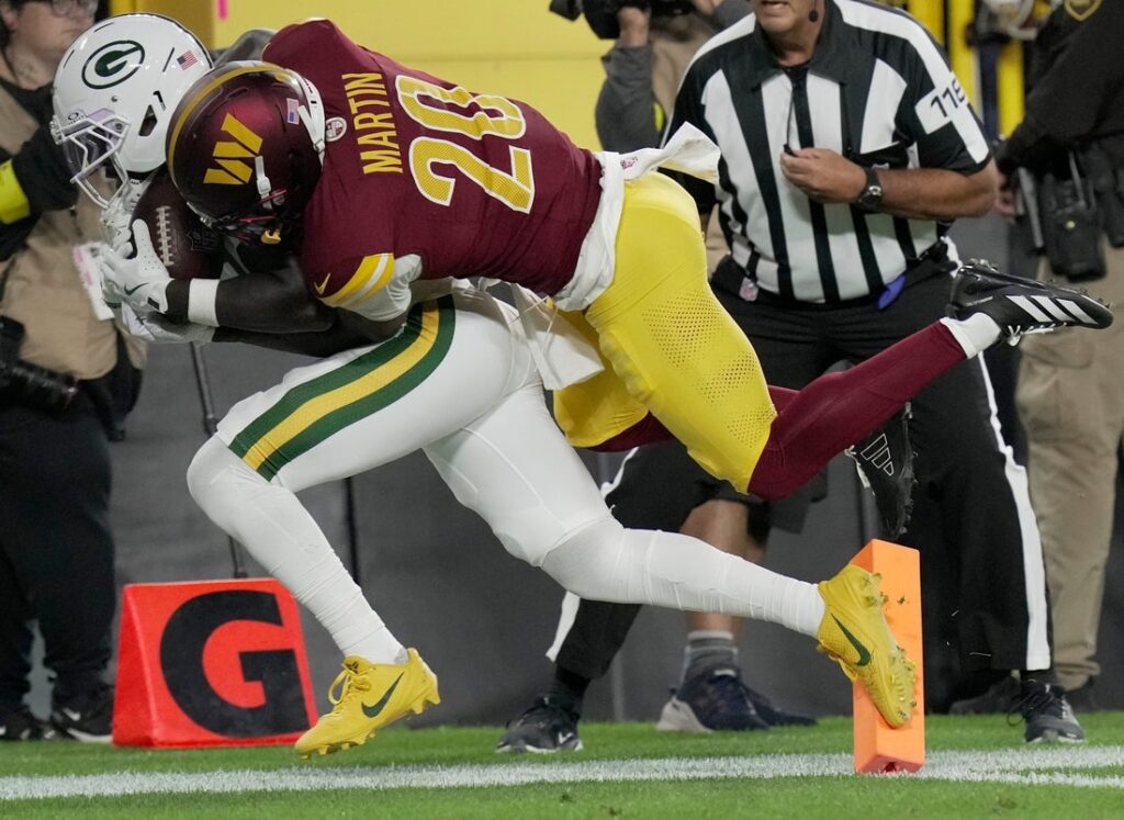 27058424-1024x747 Packers WR Jayden Reed breaks collarbone