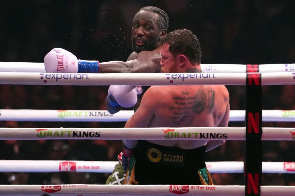 27080777-1024x683 Terence Crawford makes history with upset of Canelo Alvarez