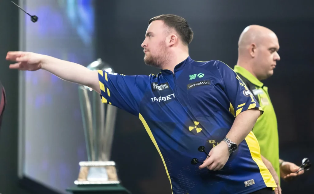 michael-van-gerwen-luke-littler-1-67785749d1c64-1024x634 Littler Clinches Players Championship 32 Title, Van Gerwen Fails to Qualify for Finals
