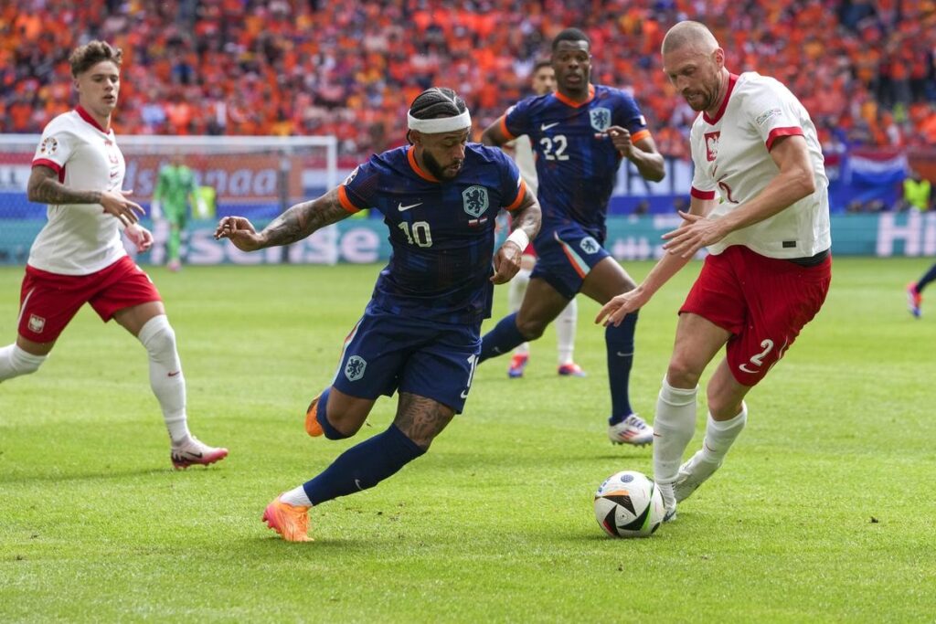 ss-i.thgim_.com-public-incoming-oxph1i-article68297239.ece-alternates-free_1200-_euro_2024_soccer_poland_netherlands_95721-1024x683 Netherlands on the brink of World Cup qualification after draw in Poland