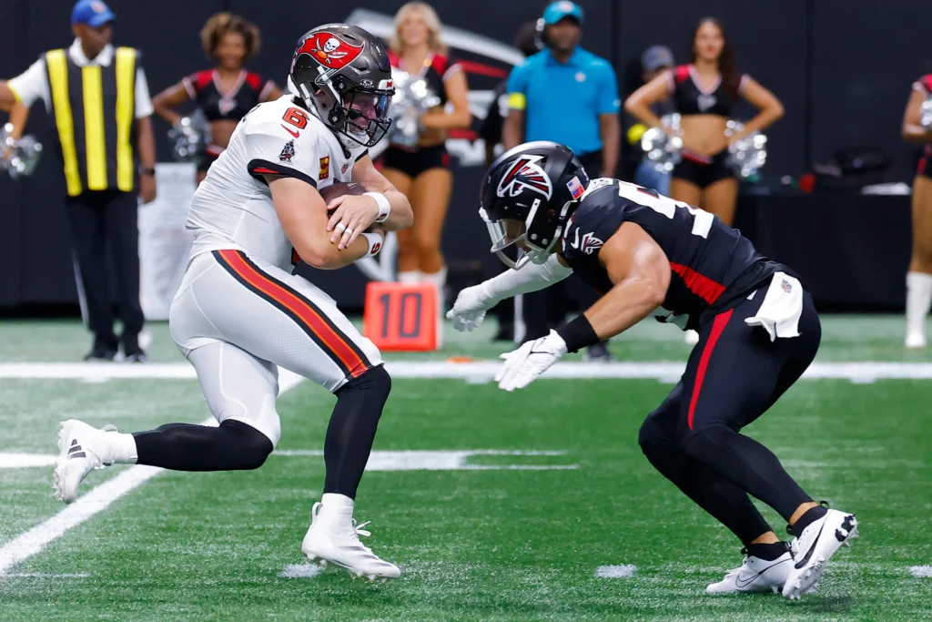 gettyimages-2234163254-1024x683 Bucs QB Baker Mayfield chased by Atlanta Falcons defenders during Week 1