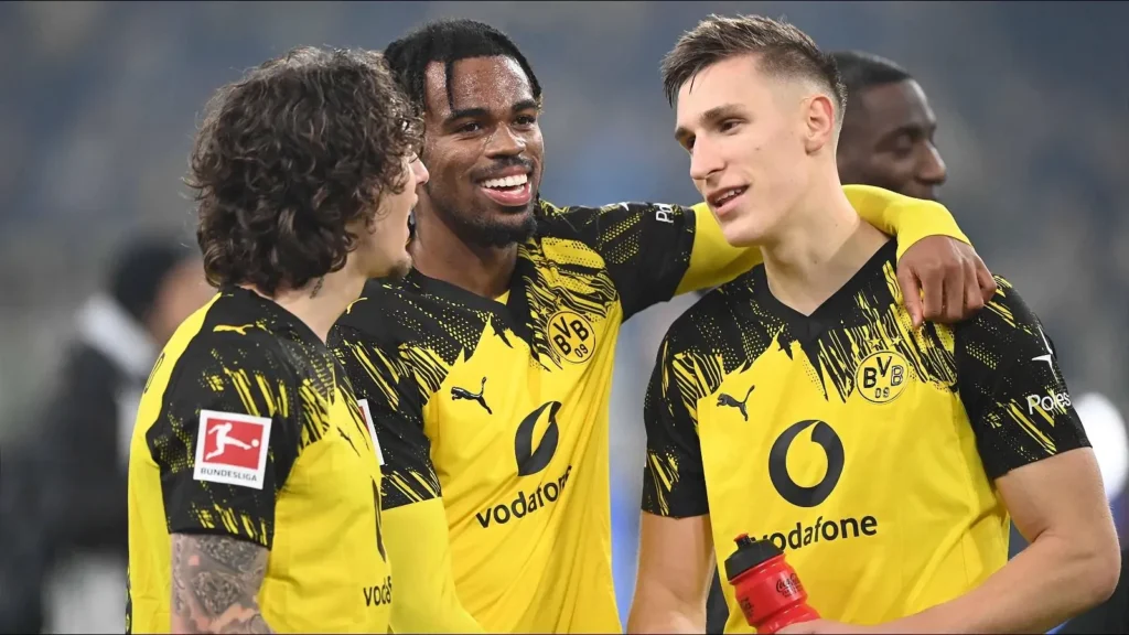 borussia-dortmund-s-carney-chukwuemeka-centre-celebrates-scoring-9-january-202616-1024x576 Late drama as Frankfurt and Dortmund draw in six-goal Bundesliga thriller