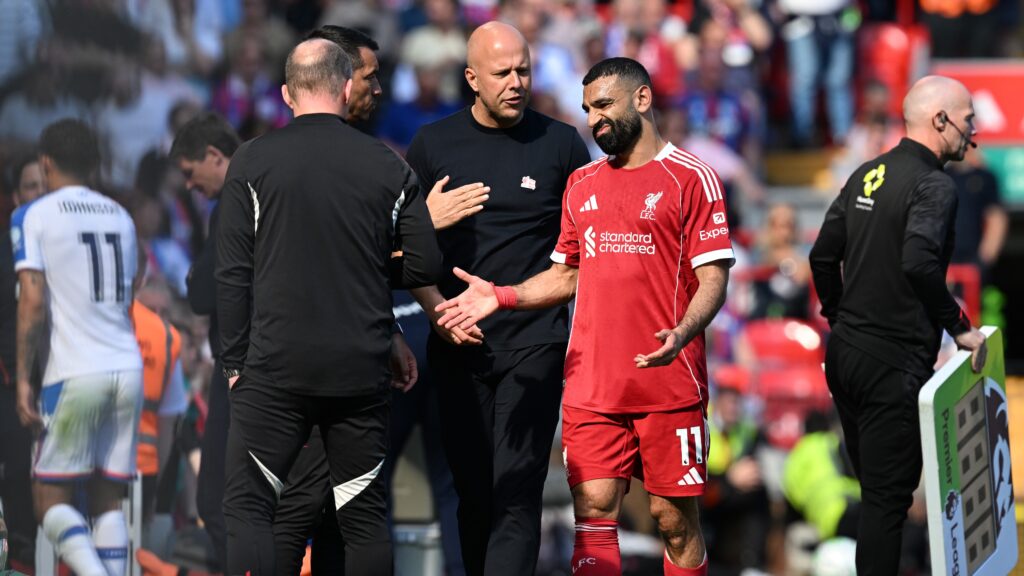 Mohamed_Salah_of_Liverpool_reacts_with_Arne_Slot_Manager_of_Liverpool_as_he_is_substituted_off_after_picking_up_an_injury_during_the_Premier_League-1024x576 Salah injury blow confirmed as Egypt director Hassan rules him out for season run-in