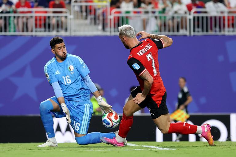 image Austria and Algeria through after six-goal thriller